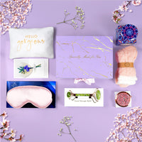 Elegant gift basket for women featuring self-care items on a lavender background.